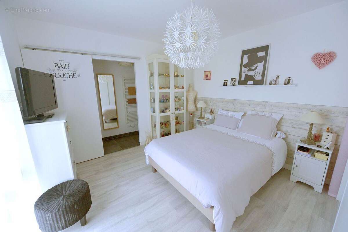 Maison 107 m² à Semussac  - photo 4
