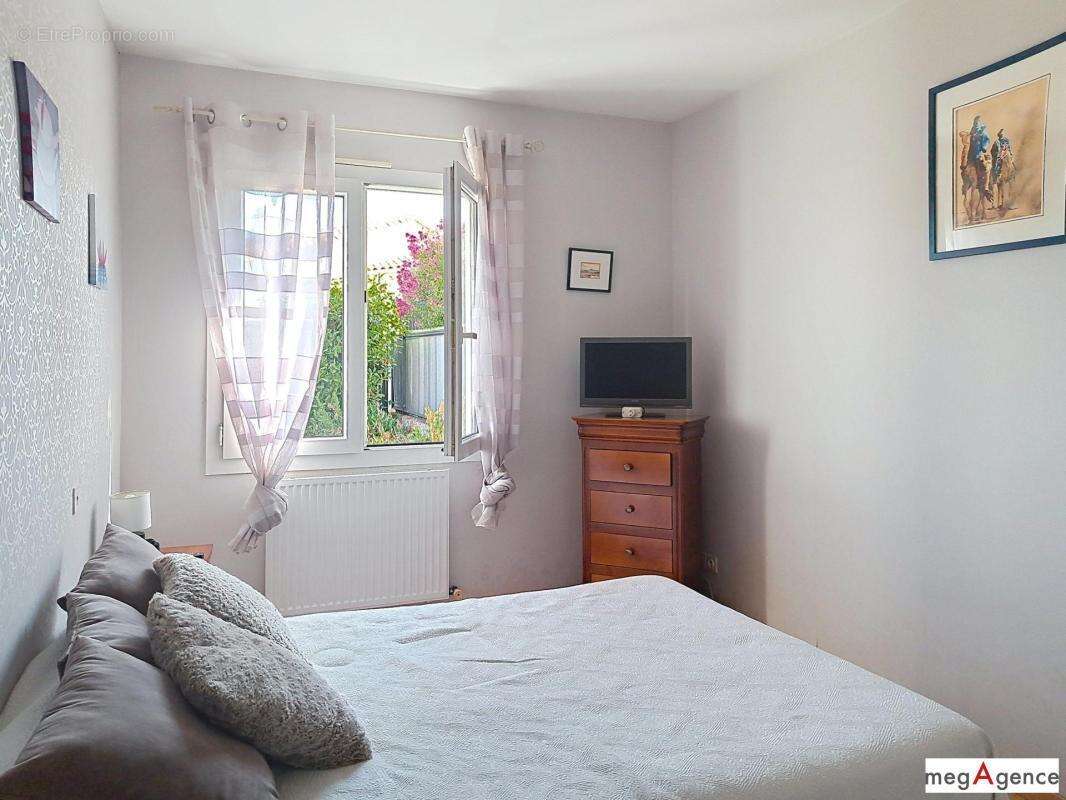 Vertou Bourg – Maison de plain-pied avec beaux volumes et 2 garages - photo 10
