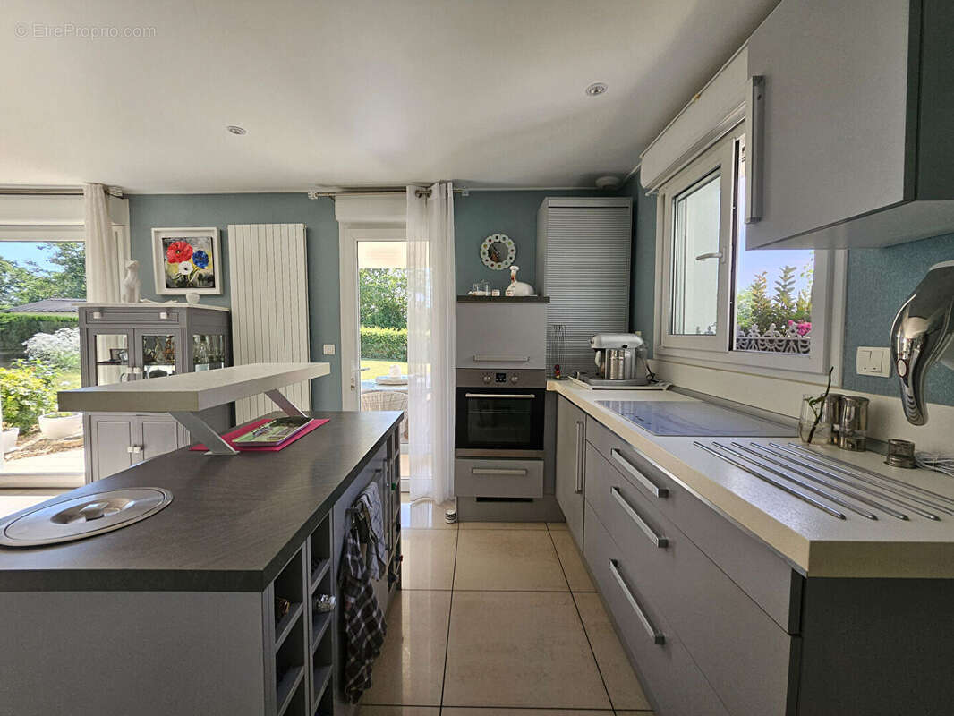 Maison d'exception à Vendre à Rivery - Un Écrin de Prestige de 200 m² - photo 5