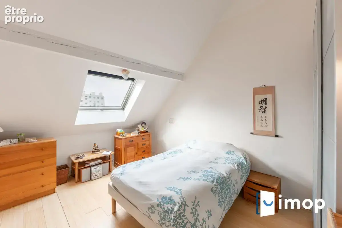 Duplex familial de 89 m² avec balcon, parking et cave - photo 10