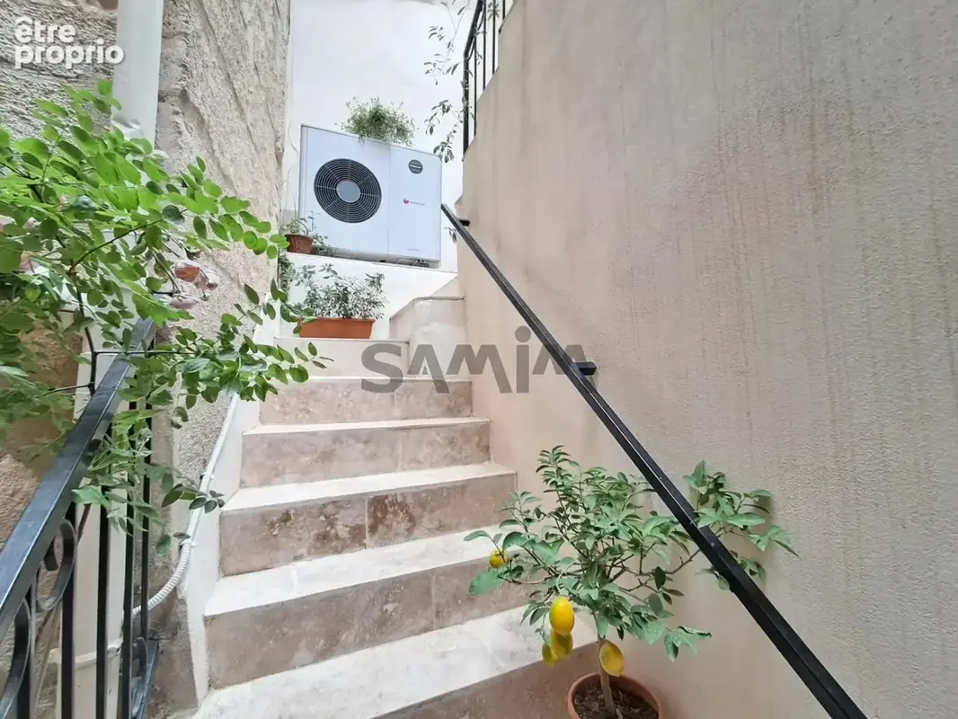 A vendre- charmante maison de ville avec garage et joli pati - photo 9