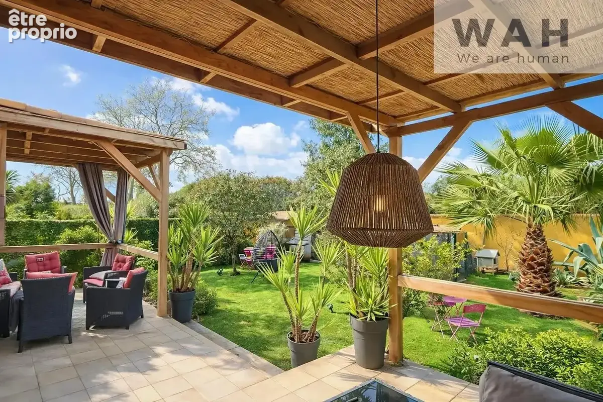 Maison de plain-pied 110 m2 avec jardin arboré et garage. - photo 3