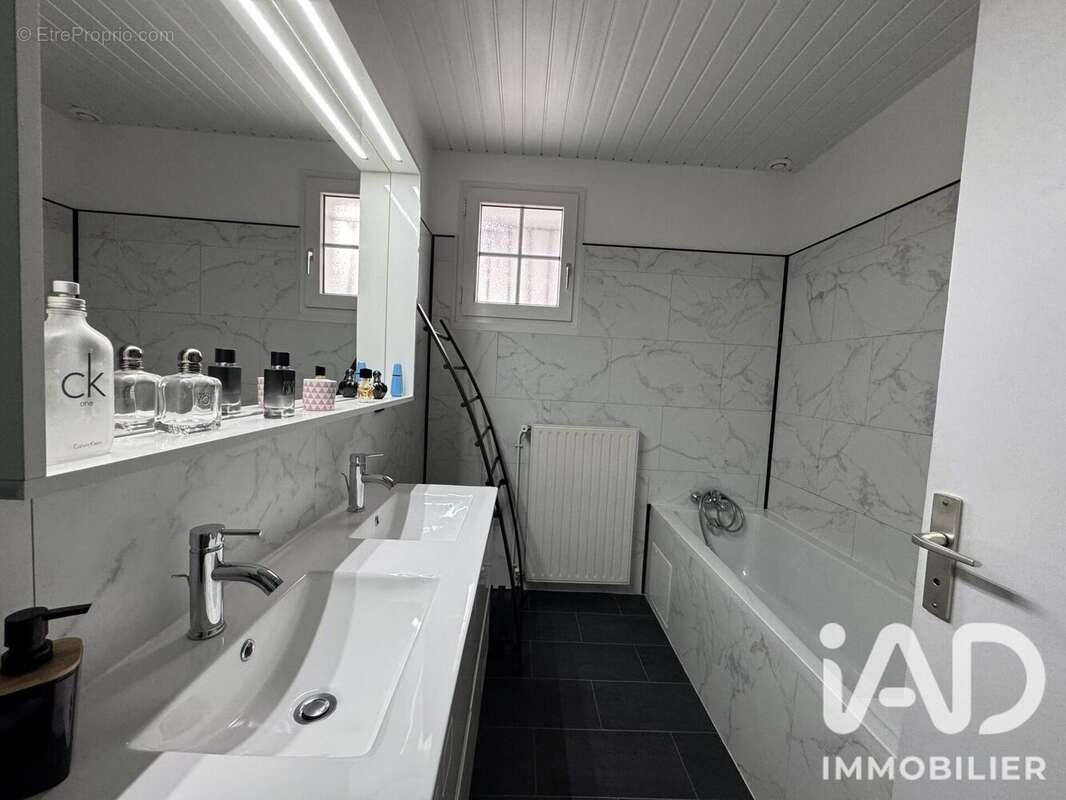 Maison 102 m² à Saint-Jean-De-Boiseau  - photo 9