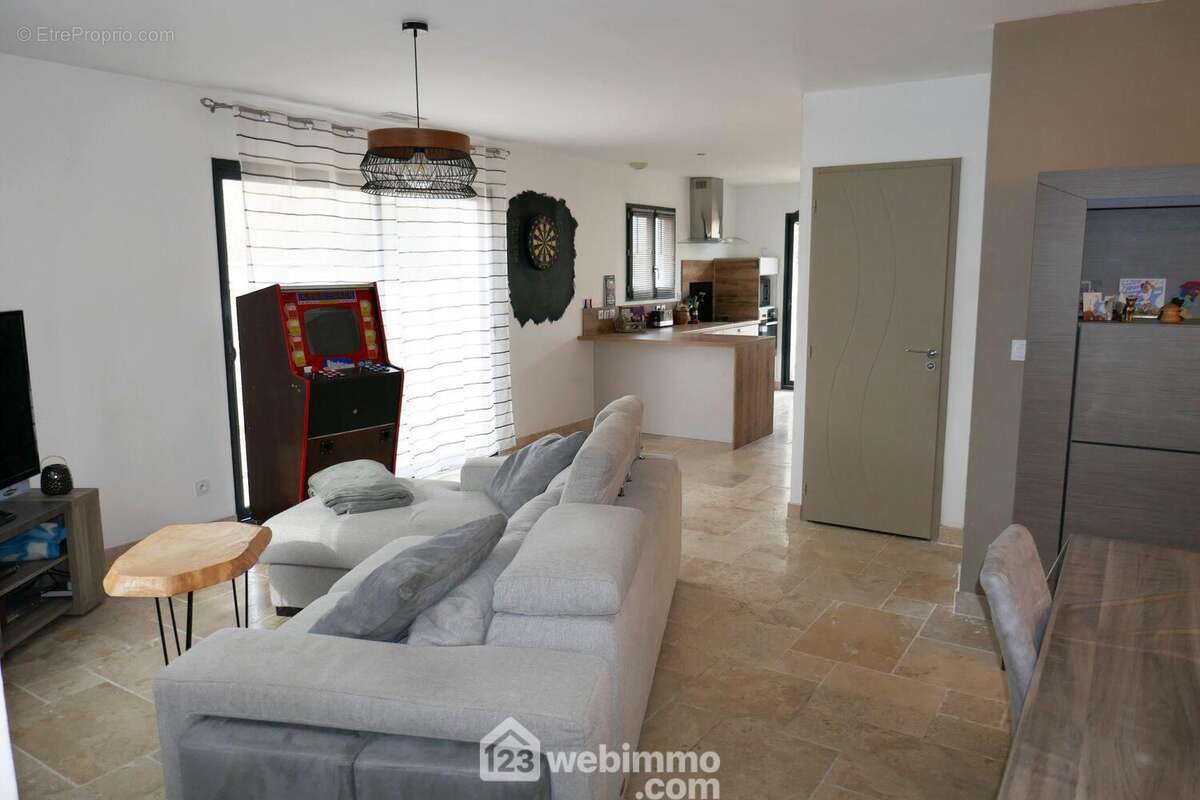La pièce à vivre de 41m² - Maison à ARLES