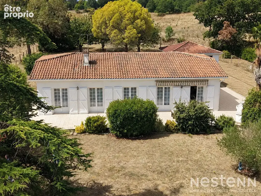A Vendre Maison de plain-pied de 136 m² avec double garage sur terrain arboré d'environ 4 800 m² - photo 18