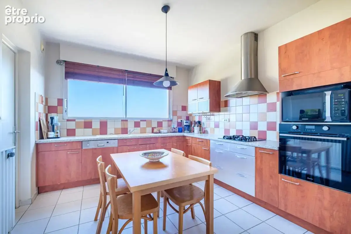 Appartement 4 pièces 108 m² à vendre à Bron (69500) - photo 5