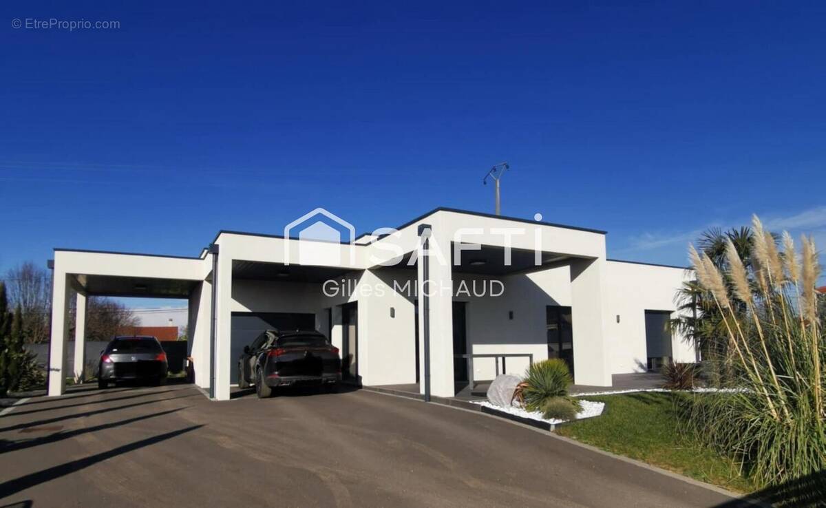 Photo 1 - Maison à LE COTEAU