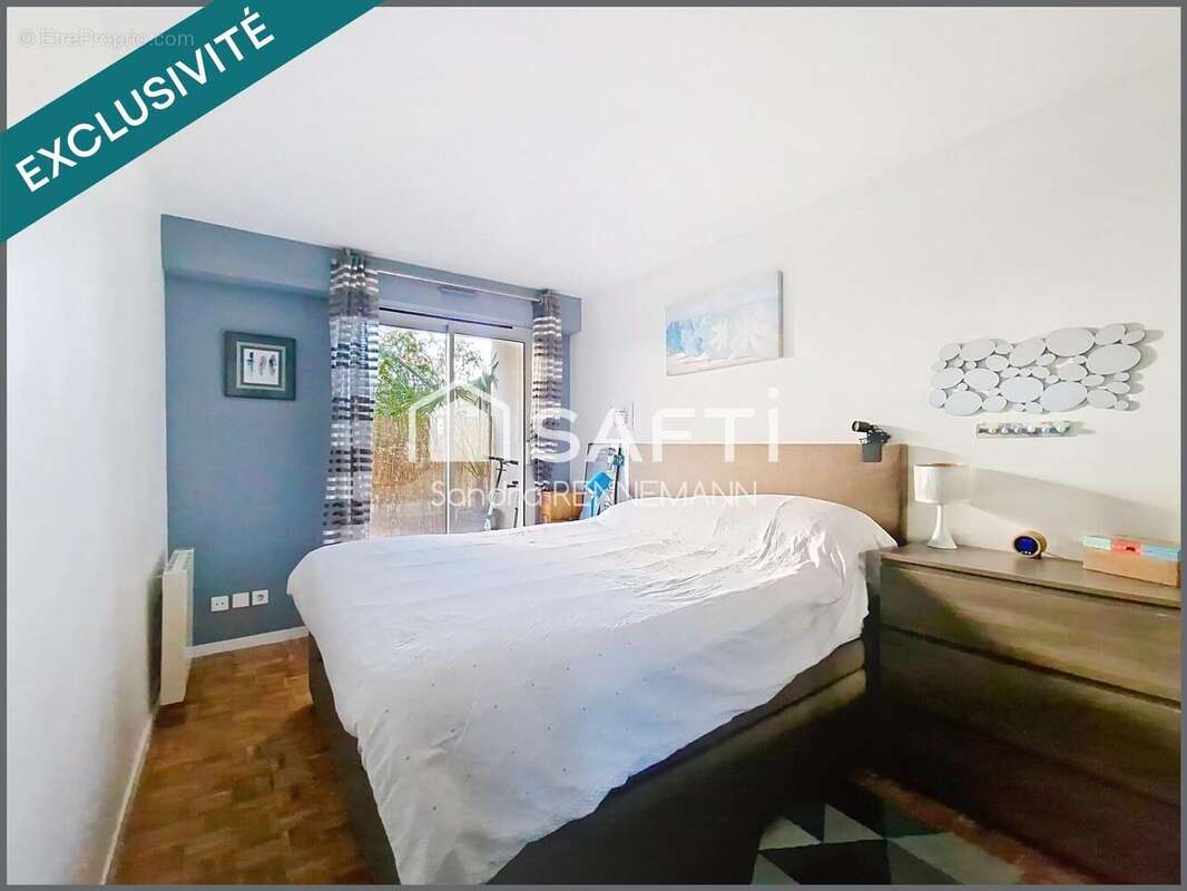 Photo 6 - Appartement à LA GARENNE-COLOMBES