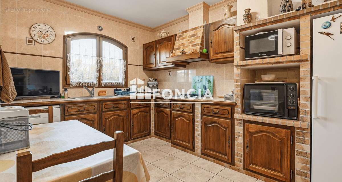 Maison de plain pied de 150m2 avec jardin, cabanon, garage et cave - photo 10