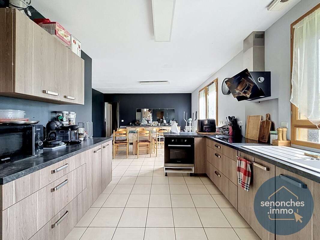 Pavillon de plain-pied 4 chambres  100 m² habitables  terrain de 2 244 m²  environnement calme et verdoyant - photo 4