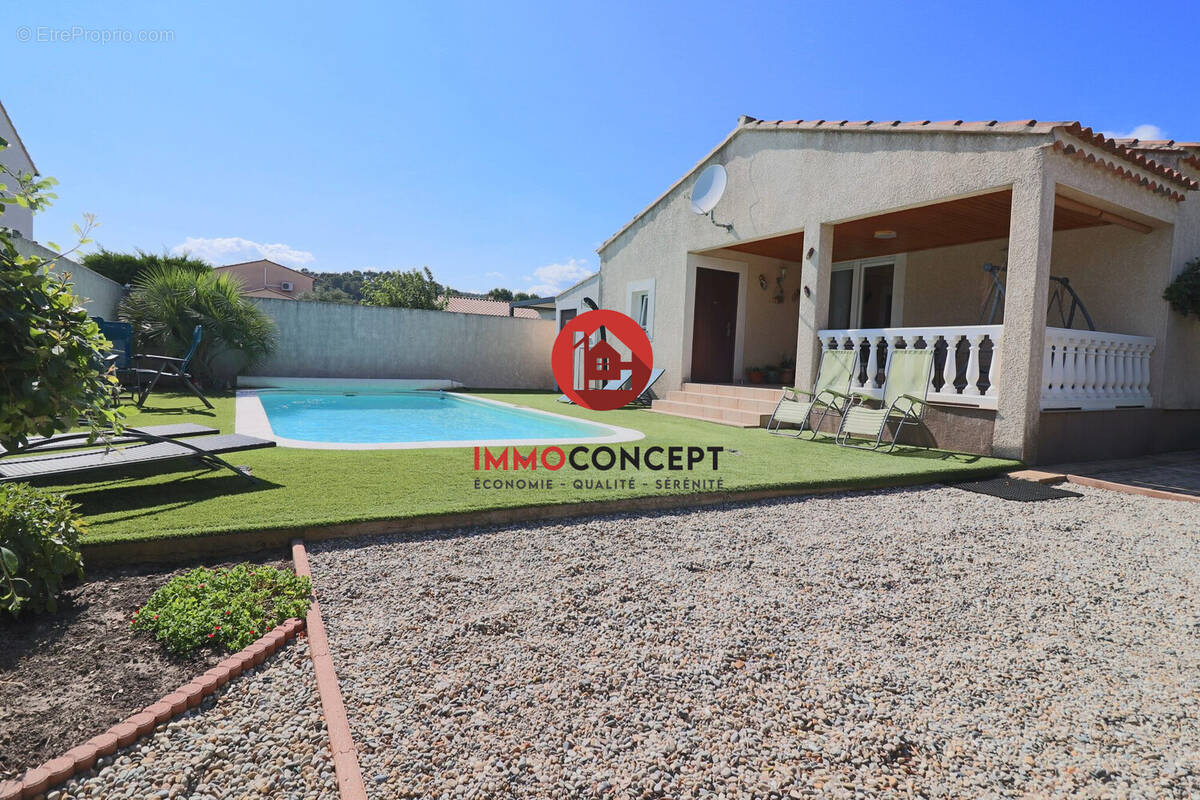 Maison à LAUDUN-L'ARDOISE