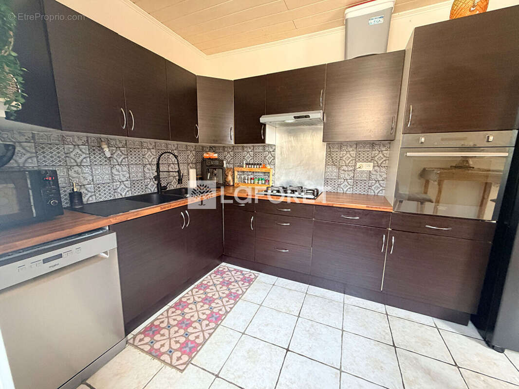 Maison 90 m² à Carmaux  - photo 4