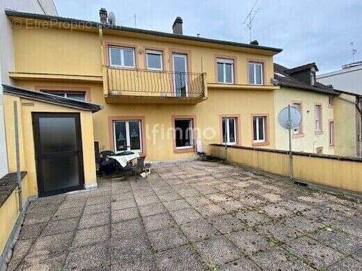 Immeuble comprenant un local commercial et deux appartements - photo 13
