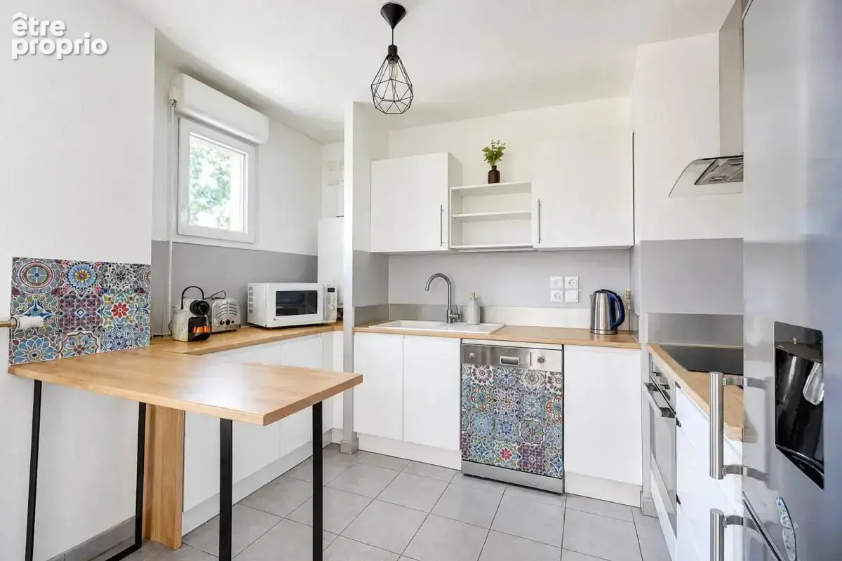Appartement de 3 pièces de 68 m² à Vénissieux - photo 1