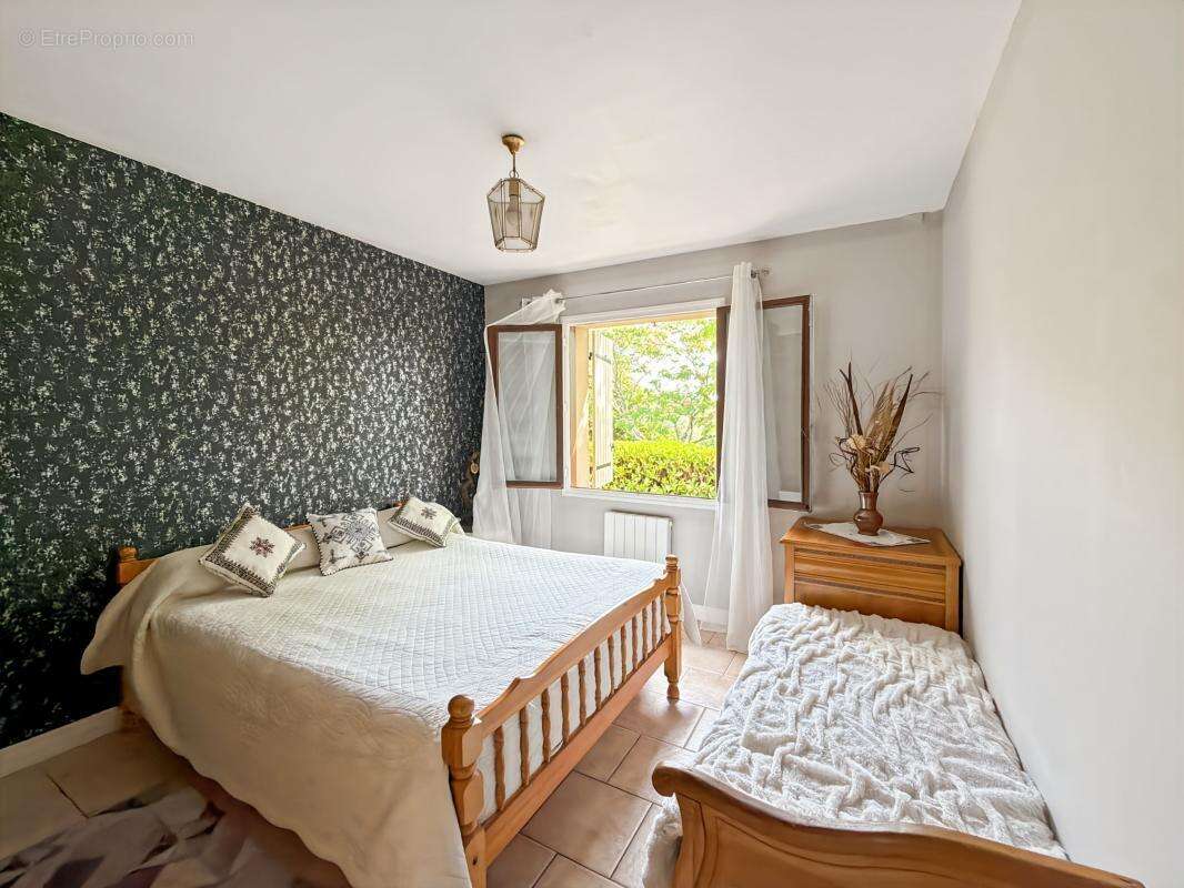  Maison familiale de plain-pied avec vue dominante – Un cadre de vie privilégié à La Chapelle-Gonaguet - photo 10
