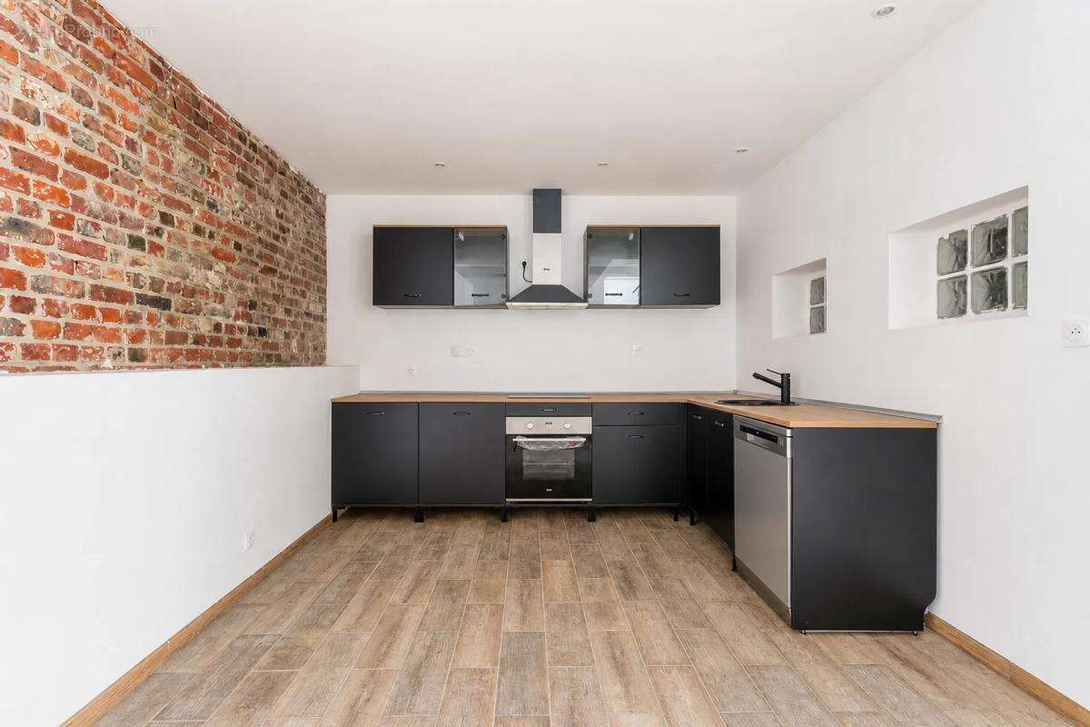 Maison de 4 pièces de 101 m² à Bauvin - photo 3