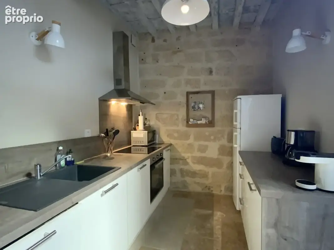 Maison en pierre rénovée avec terrasses en plein coeur historique d'Uzès. - photo 9