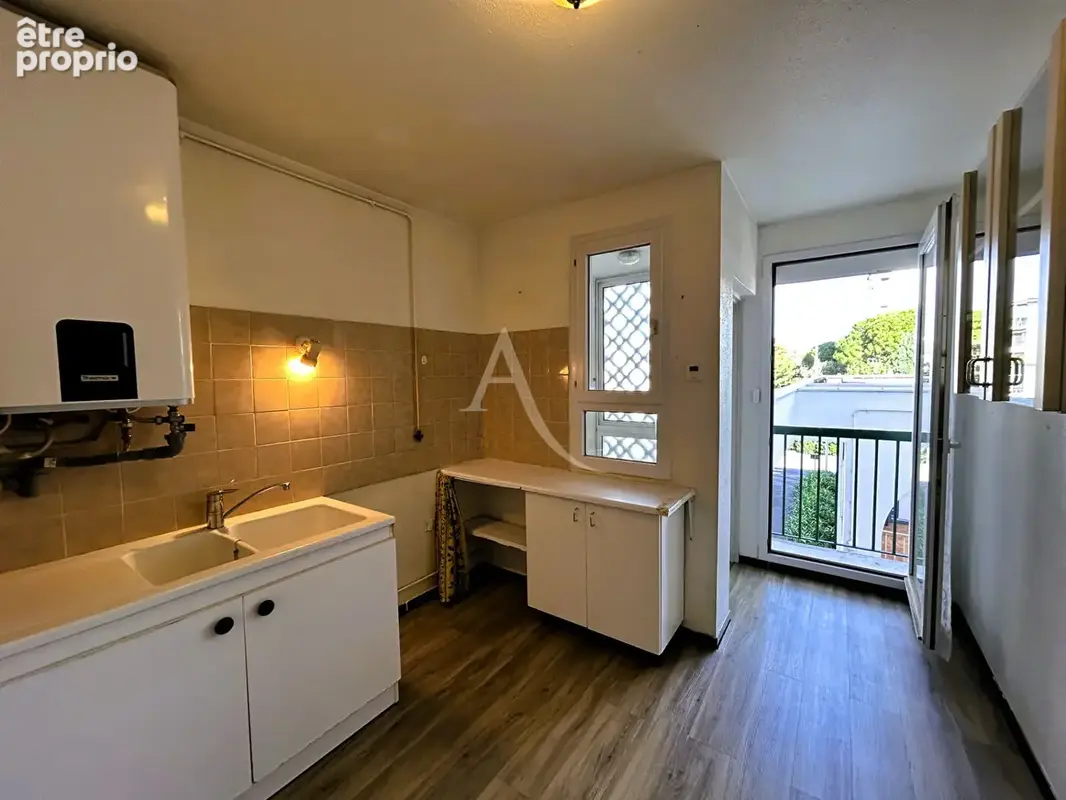 Vaste appartement Perpignan 3 pièces, double balcon et cave secteur Verte Feuille - photo 6