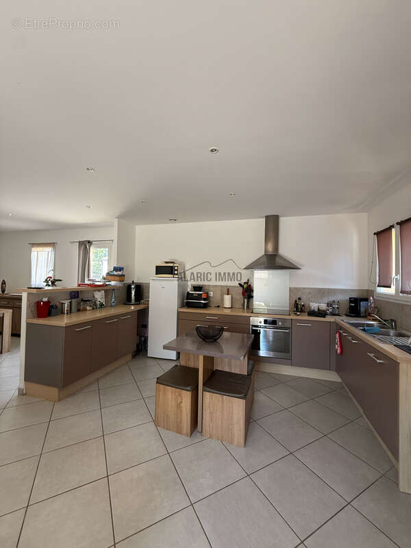 Villa plain-pied avec jardin et carport - photo 7