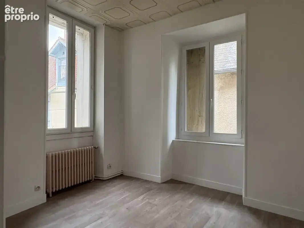 Coussac Bonneval immeuble - ancien magasin et appartement F3 - photo 13