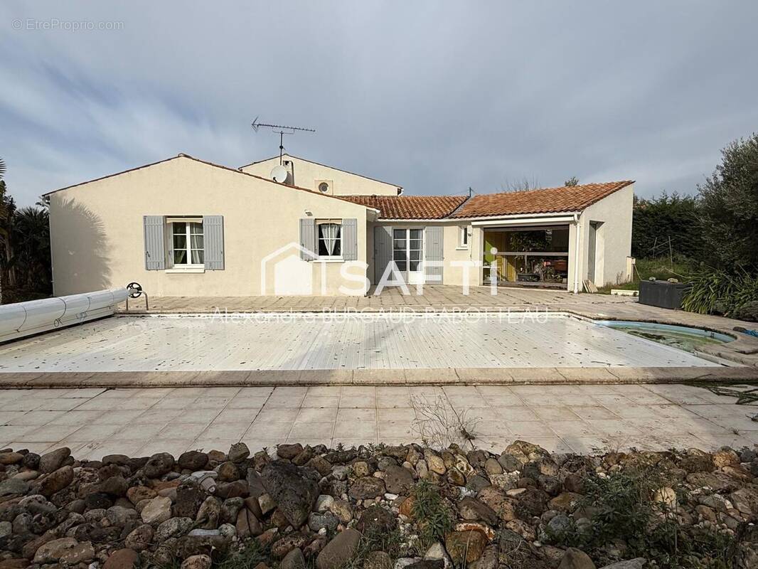 Photo 1 - Maison à LA CHAPELLE-DES-POTS