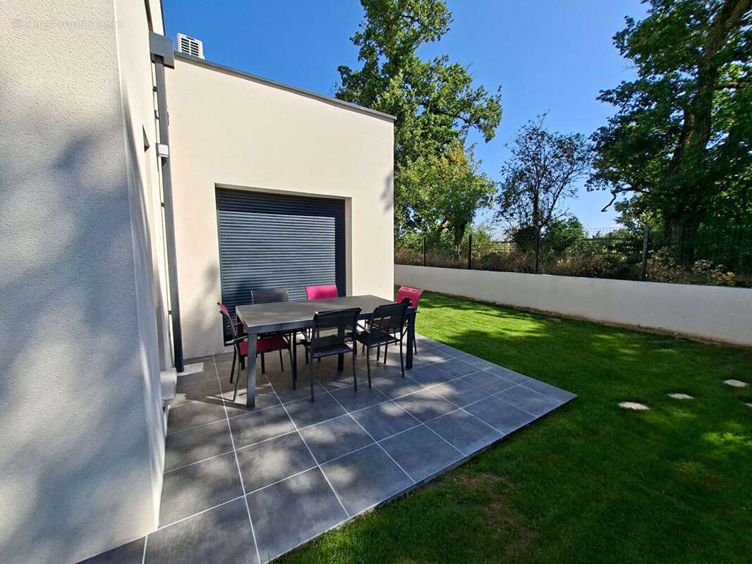 MAISON CONTEMPORAINE RT2020 5 pièce(s) 136 m2 ur 580m² terrain ROMANS SUR ISERE 26100 - photo 17