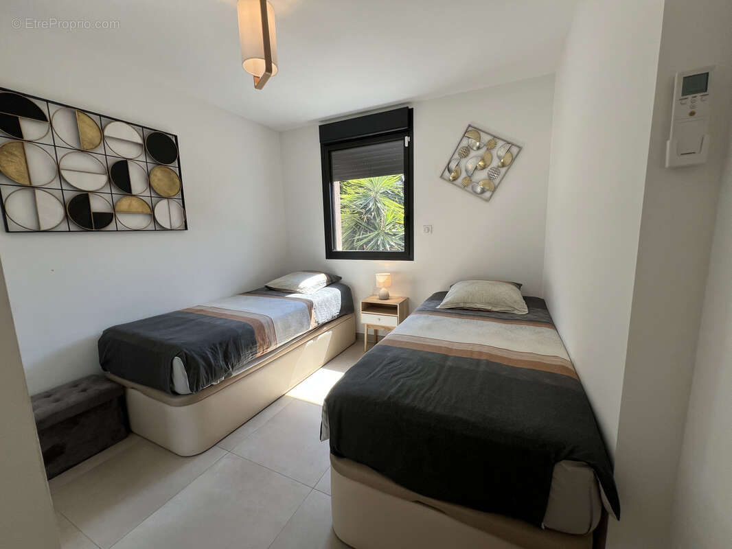 Presqu’île de Giens   Élégant appartement T3 avec vaste terrasse et stationnements privatifs - photo 8