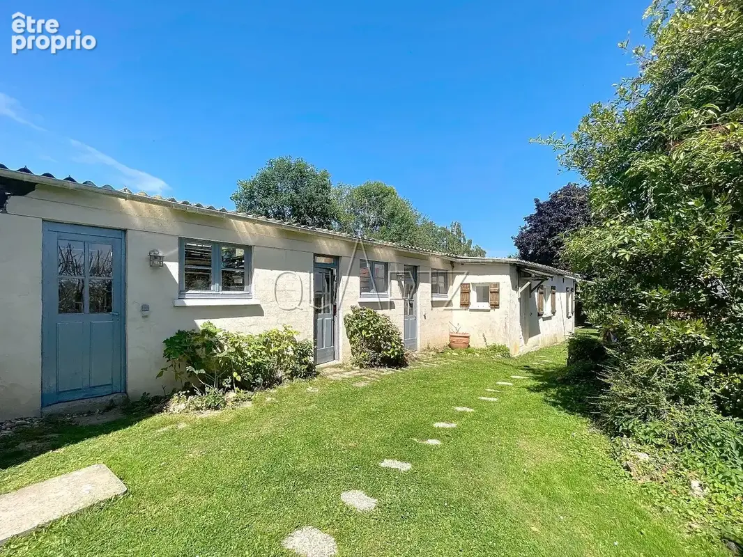 Propriété composée de deux maisons et ses annexes - photo 2