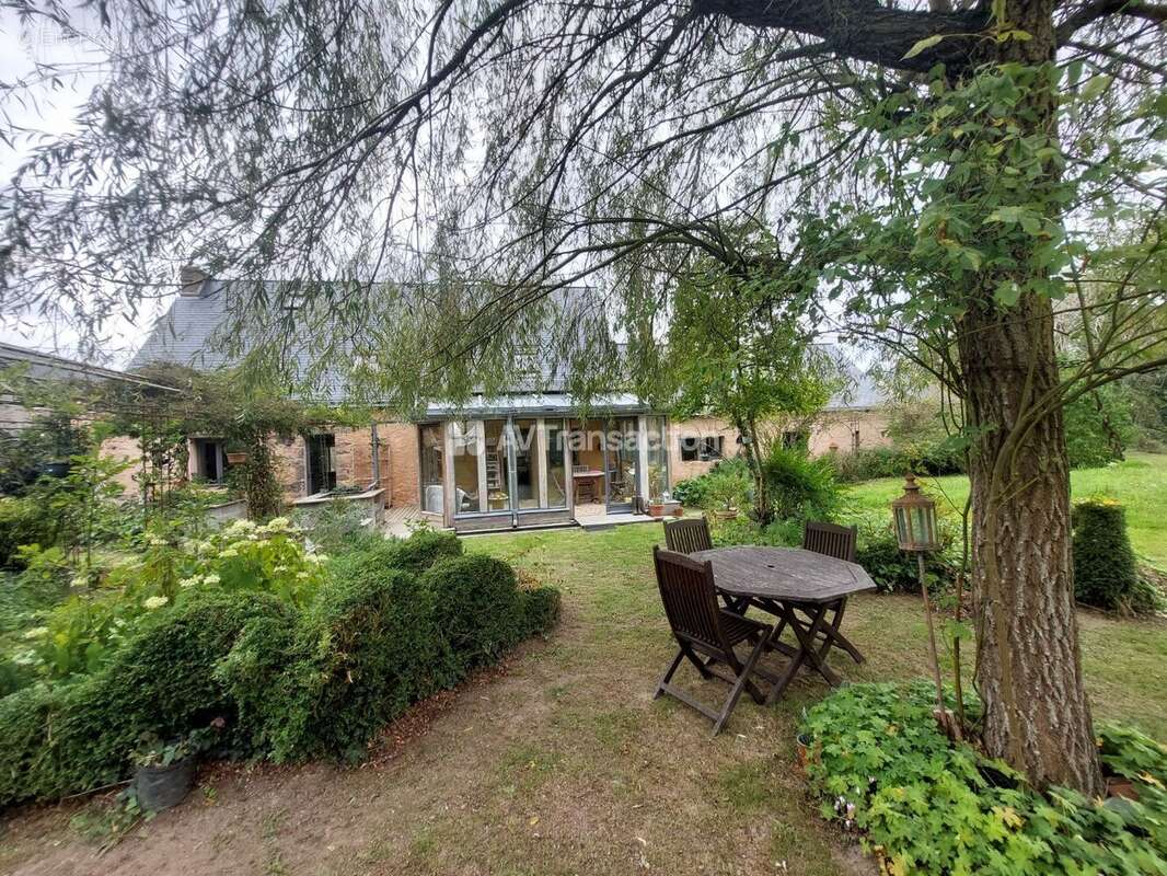 Maison à LOUVIGNE