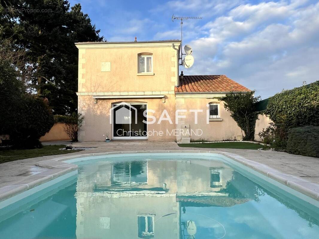 Photo 1 - Maison à DANGE-SAINT-ROMAIN