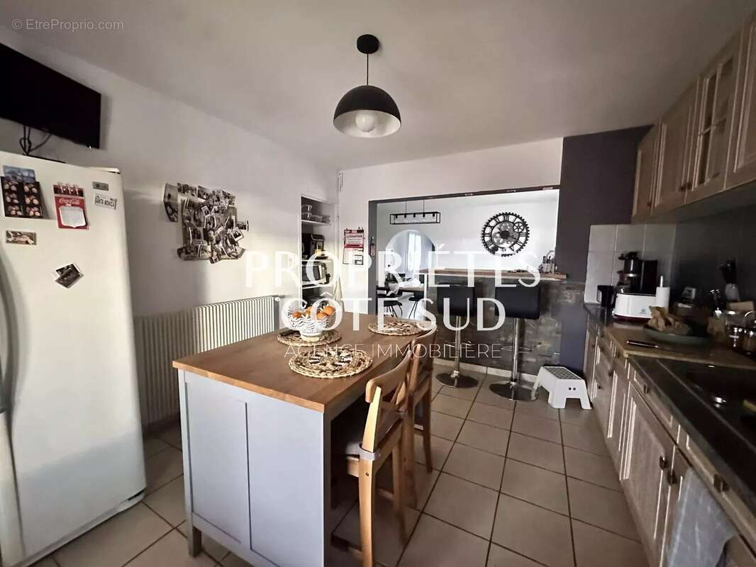 Maison à LAUDUN-L'ARDOISE