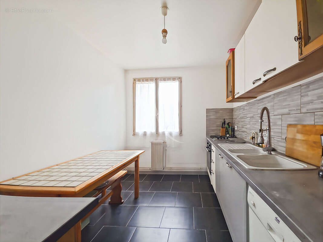Appartement Les Mureaux 5 pièce(s) 90m² - photo 5