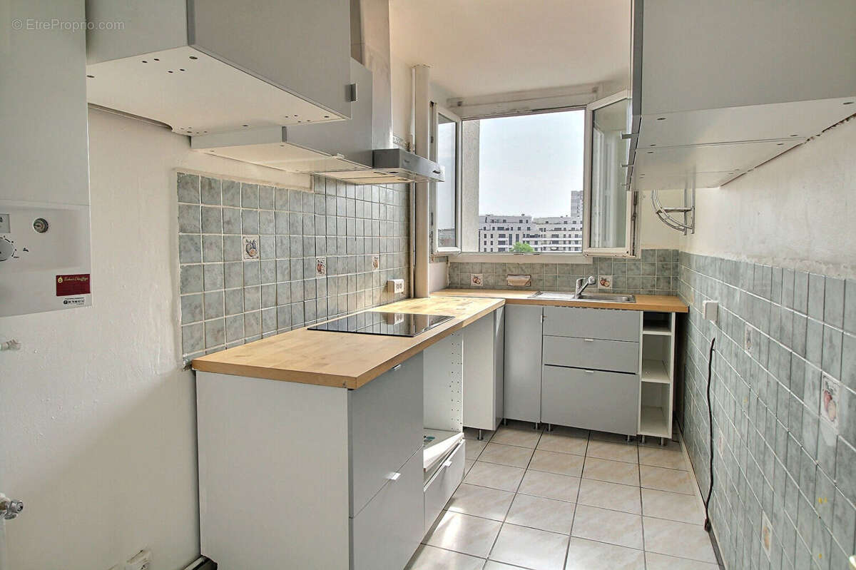 Trois pieces - quartier marceau - dernier etage - photo 4