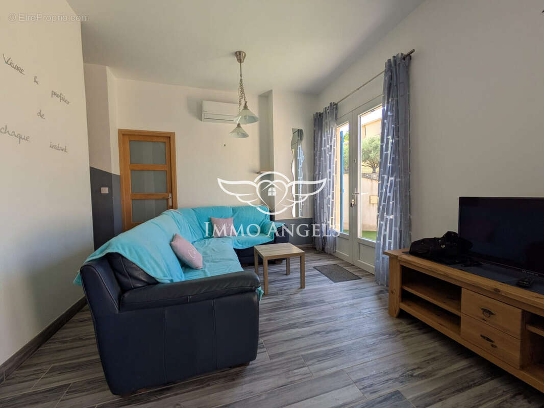 Salon - Maison à CLERMONT-L&#039;HERAULT