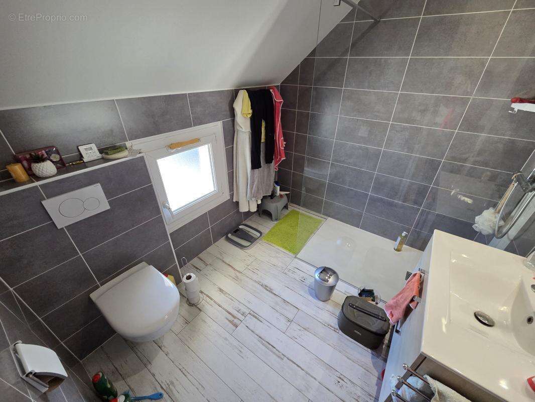 Ensemble immobilier 3 logements-parking- centre bourg neulli - photo 6