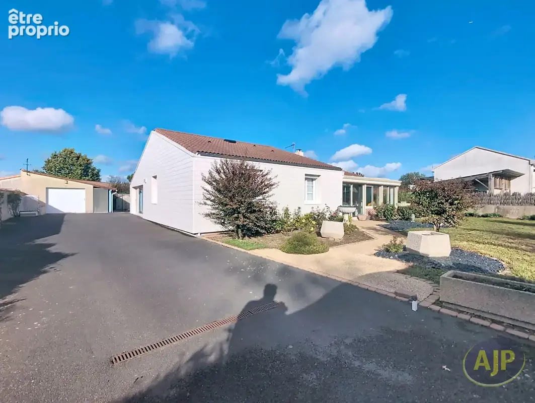 Maison de plain-pied sur une parcelle de + 1000 m² - photo 12