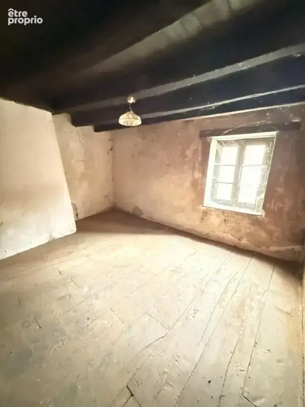 EN EXCLUSIVITE ! Maison en pierre 57m² à restaurer avec grange et garage sur terrain 486m² 29 900 € - photo 6