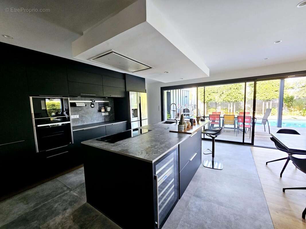 Maison 157 m² à Larmor-Plage  - photo 4
