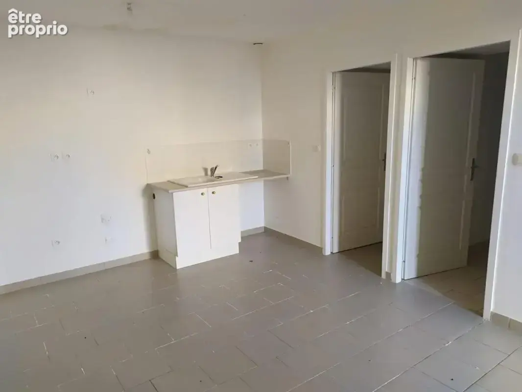 Immeuble compose de 4 appartements et 1 maison avec jardin - photo 14