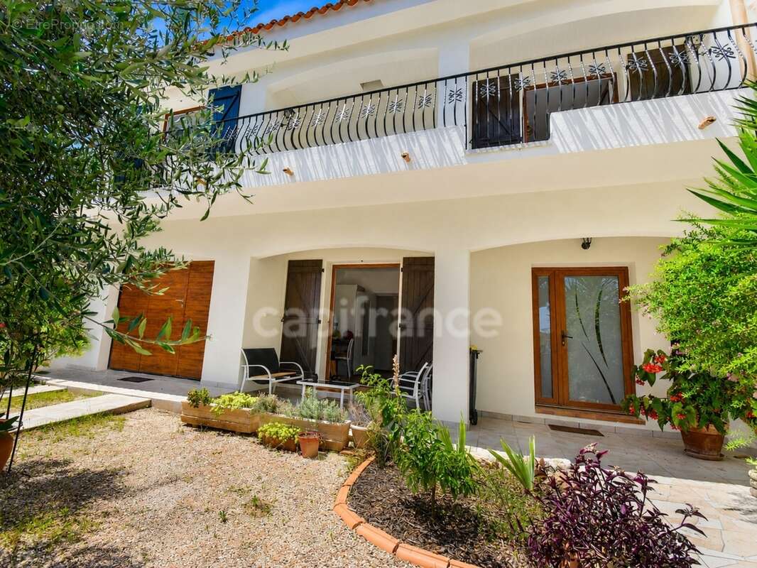Villa méditerranéenne à vendre 7 pièces, 215 m² CANET EN ROUSSILLON (66) avec potentiel 2 logements, terrasses, jardin et garage - photo 5