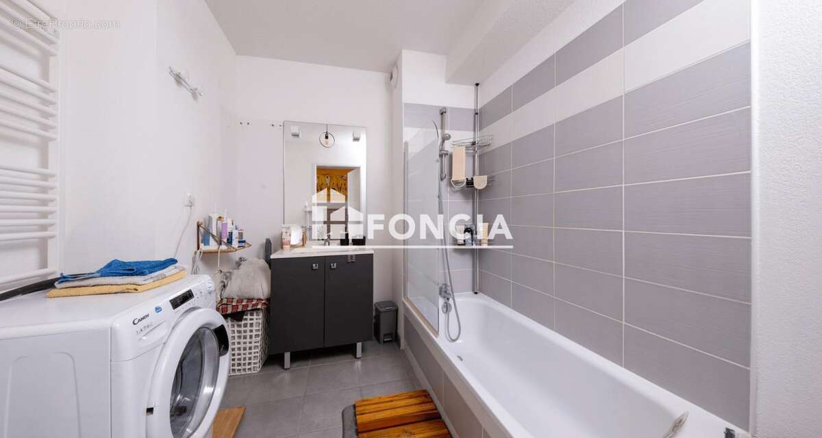 Appartement T2 en RDJ avec parking - photo 11