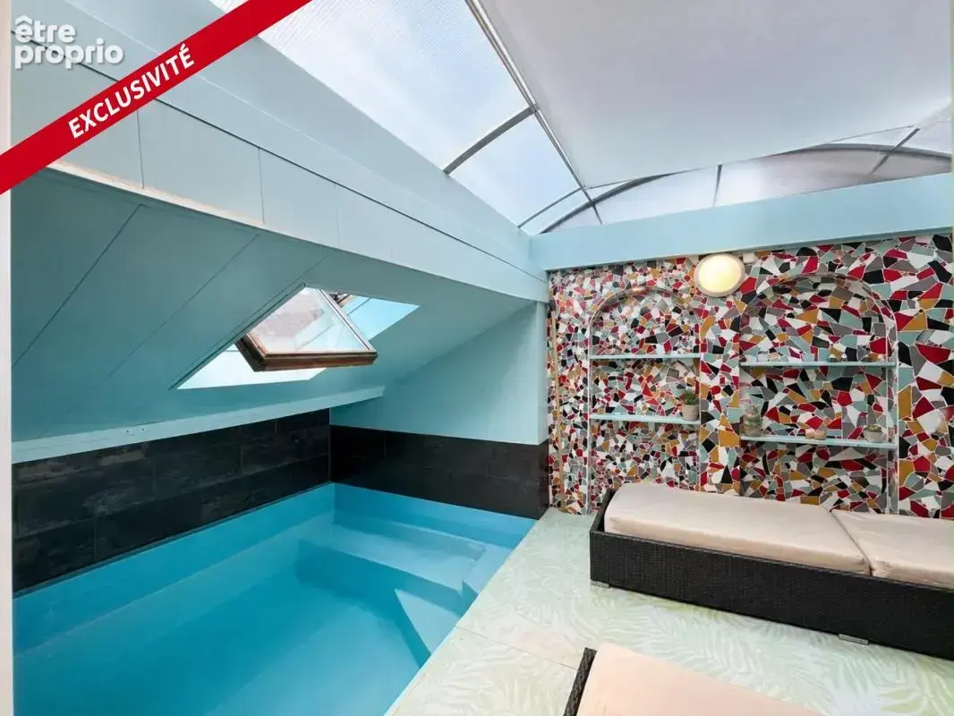 loft comprenant une cuisine, un salon, trois chambres, deux salle de bain, une terrasse et une piscine intérieure - photo 9