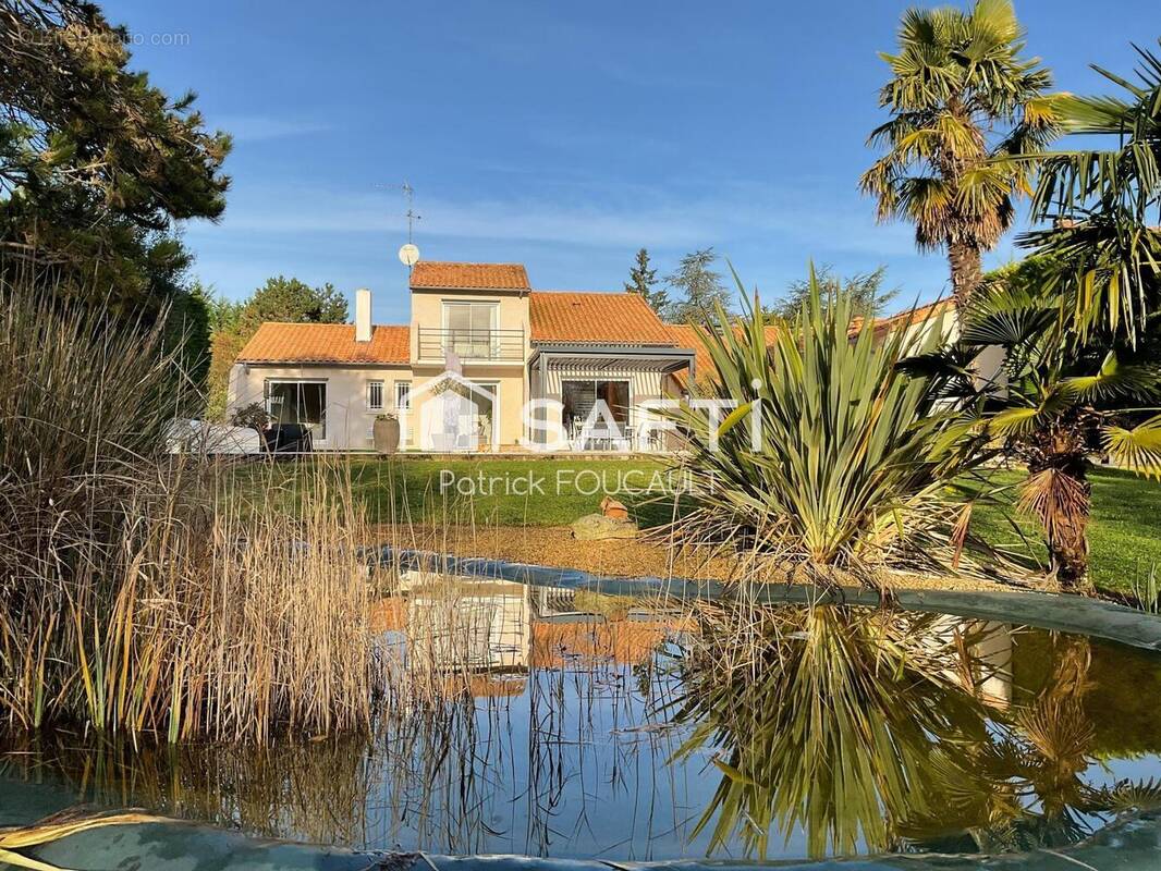 Photo 1 - Maison à MIGNE-AUXANCES