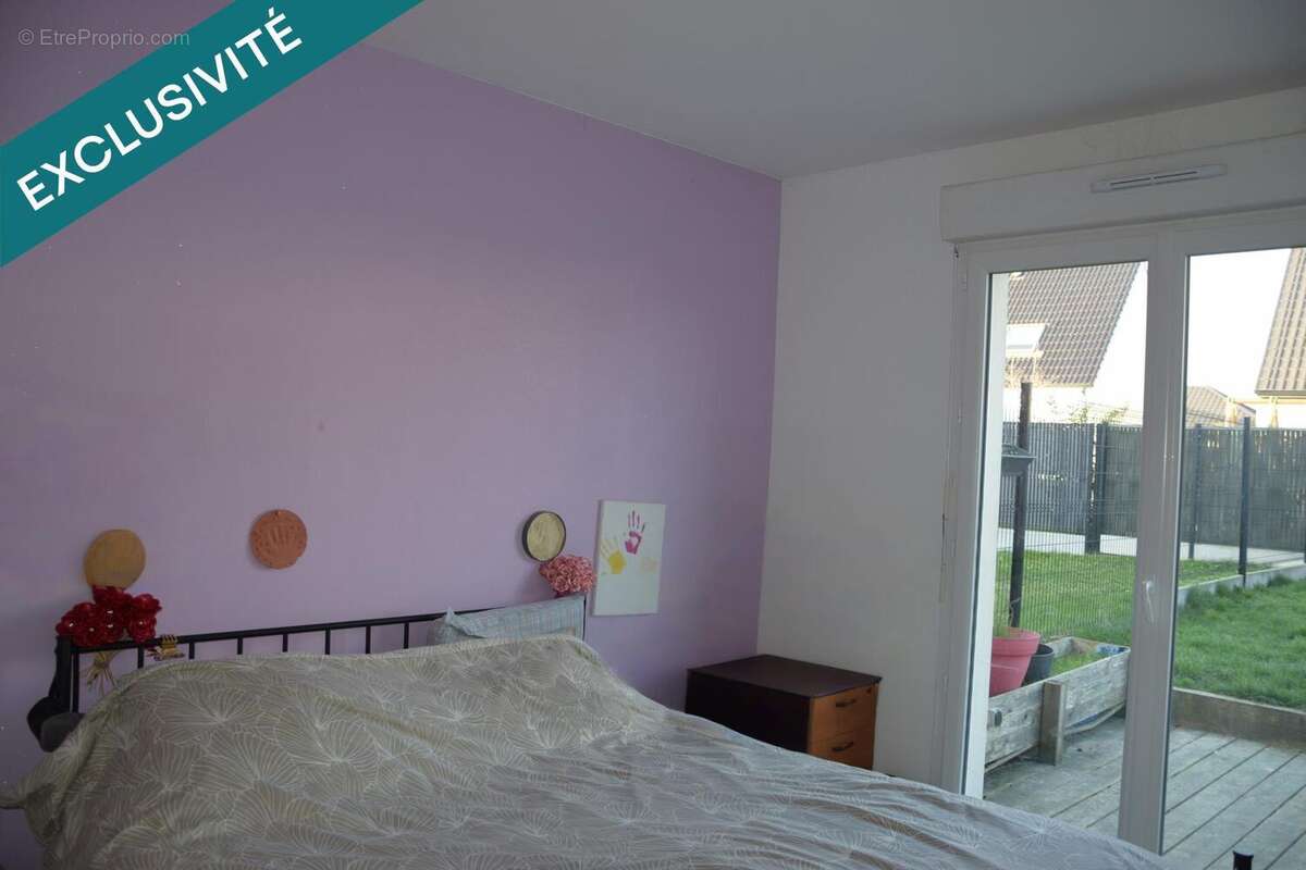 Maison 110 m² à Evin-Malmaison  - photo 5