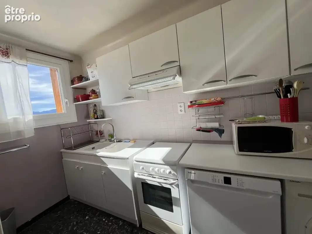 Grand appartement en plein centre du village - photo 5