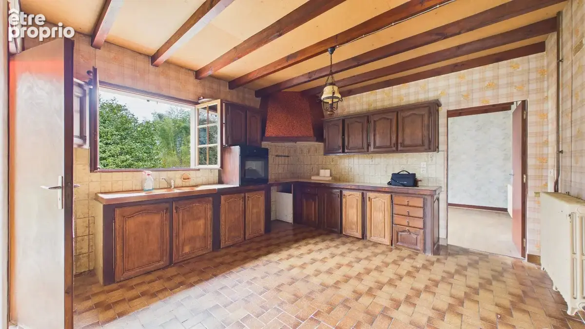 Maison des années 80 à rénover sur terrain constructible de 1191 m² - photo 3