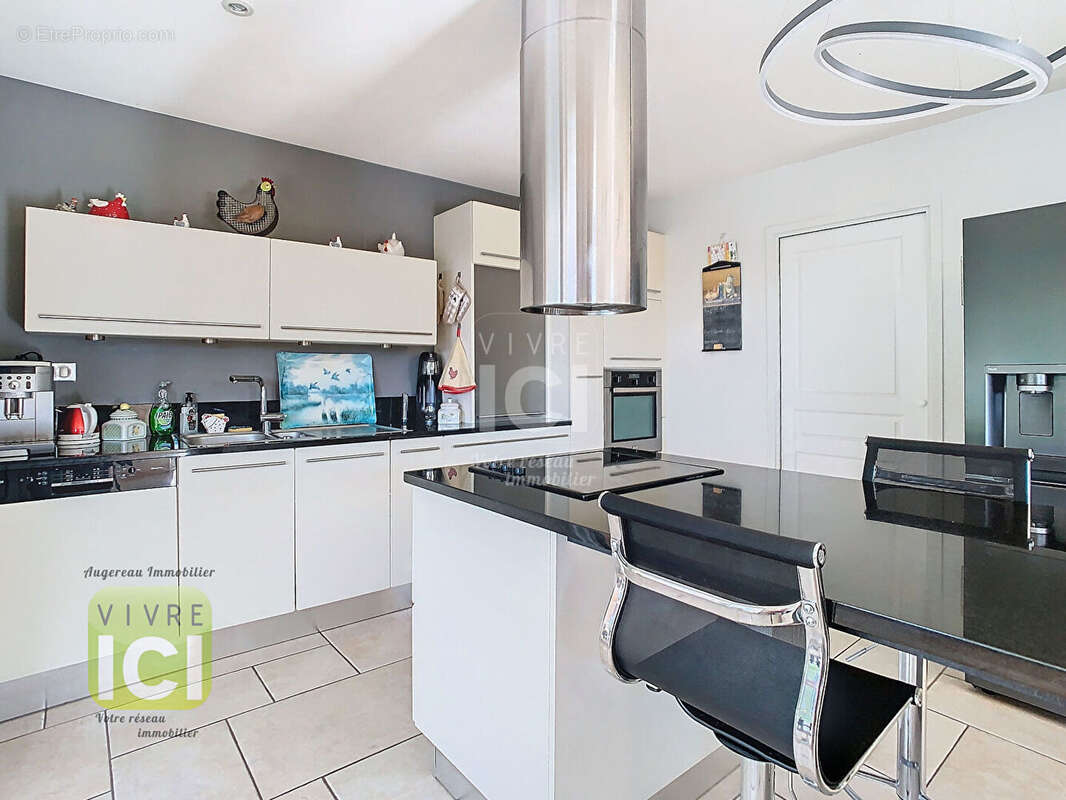 Maison de plain-pied 163.85 m2 - photo 9