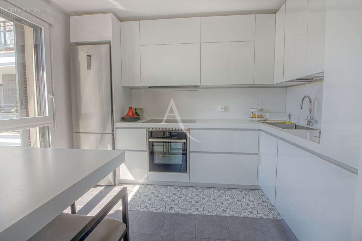 Appartement  5 pièce(s) 88.93 m2 4 chambres + 3 parkings (dont 1 box) - photo 5