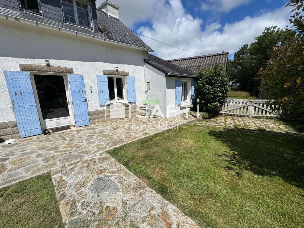 Photo 2 - Maison à CHATEAUNEUF-DU-FAOU