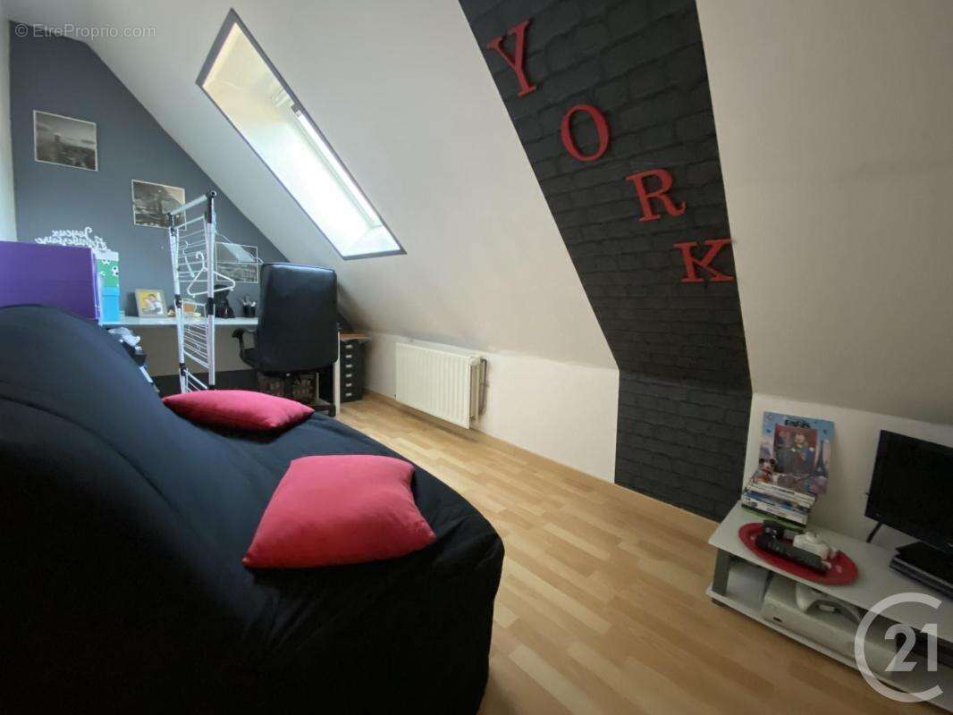 Maison à MOGNEVILLE